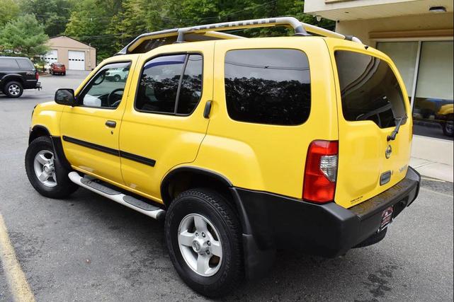 Photo of 2004 Solar Yellow Nissan Xterra