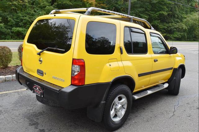 Photo of 2004 Solar Yellow Nissan Xterra