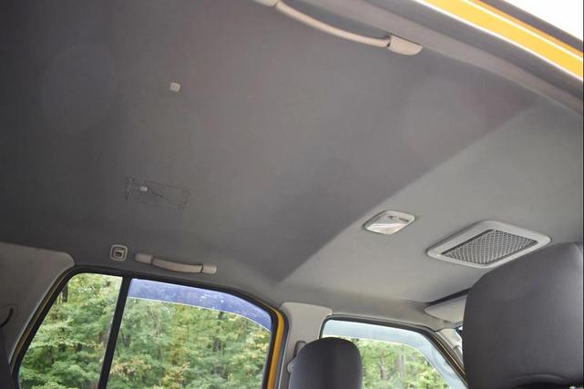 Photo of 2004 Solar Yellow Nissan Xterra