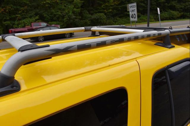 Photo of 2004 Solar Yellow Nissan Xterra