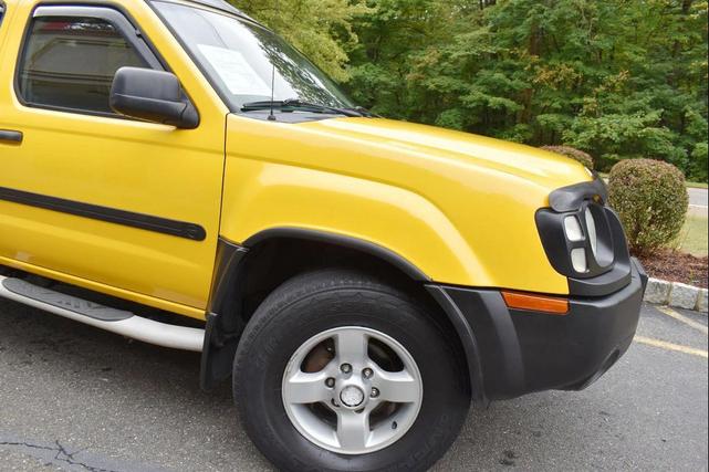Photo of 2004 Solar Yellow Nissan Xterra