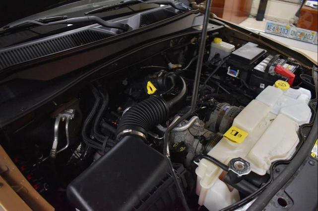 Photo of 2012 Canyon Brown Pearlcoat Jeep Liberty