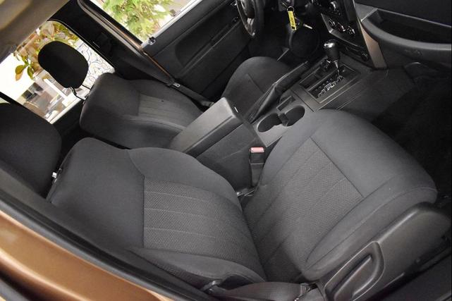 Photo of 2012 Canyon Brown Pearlcoat Jeep Liberty