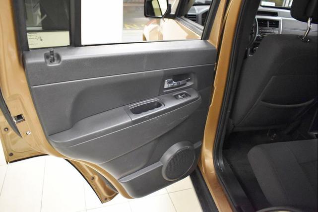 Photo of 2012 Canyon Brown Pearlcoat Jeep Liberty
