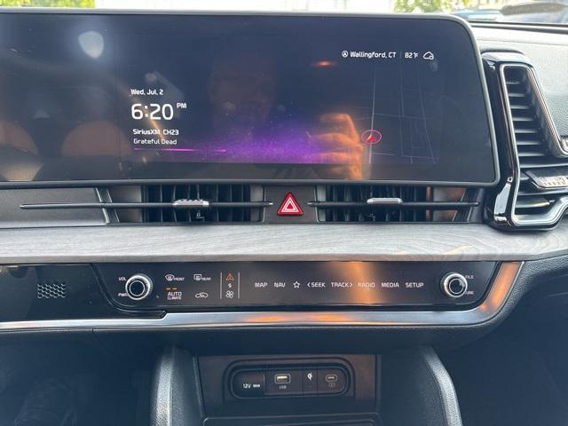 Photo of 2023 Jungle Green Kia Sportage