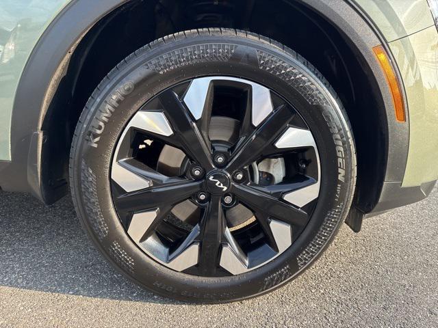 Photo of 2023 Jungle Green Kia Sportage