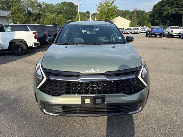 Photo of 2023 Jungle Green Kia Sportage