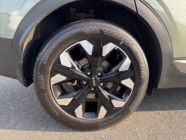 Photo of 2023 Jungle Green Kia Sportage
