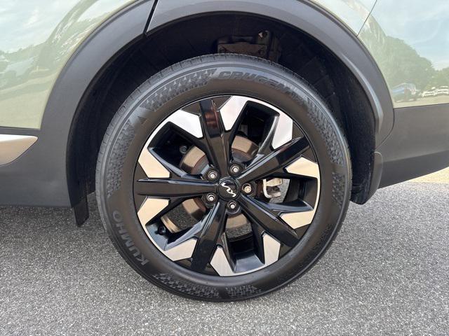 Photo of 2023 Jungle Green Kia Sportage