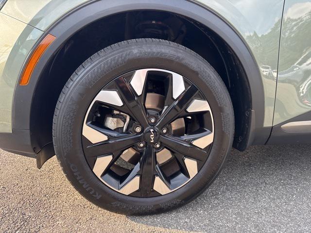Photo of 2023 Jungle Green Kia Sportage