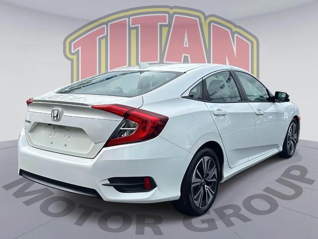 Photo of 2016 White Orchid Pearl Honda Civic