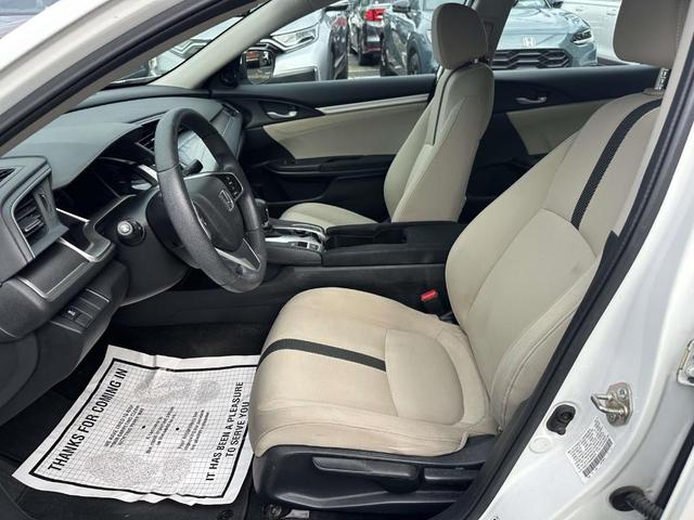 Photo of 2016 White Orchid Pearl Honda Civic