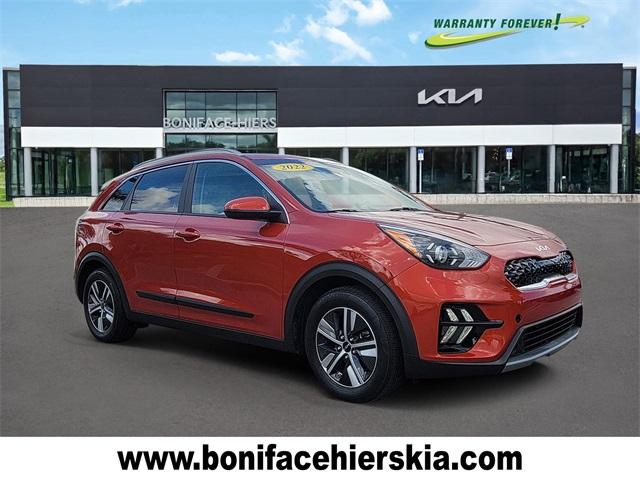 Photo of 2022 Solar Orange Kia Niro