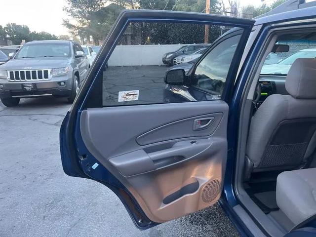 Photo of 2005 Nautical Blue Hyundai TUCSON