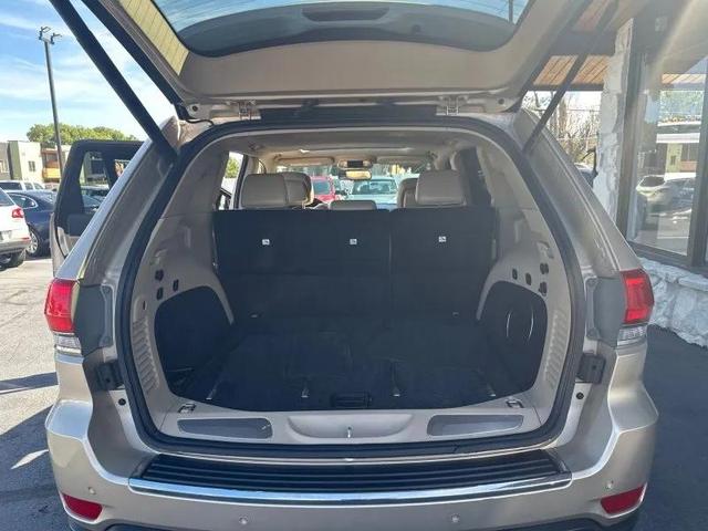 Photo of 2014 Beige Jeep Grand Cherokee