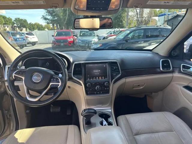 Photo of 2014 Beige Jeep Grand Cherokee