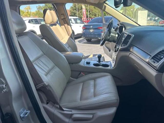 Photo of 2014 Beige Jeep Grand Cherokee