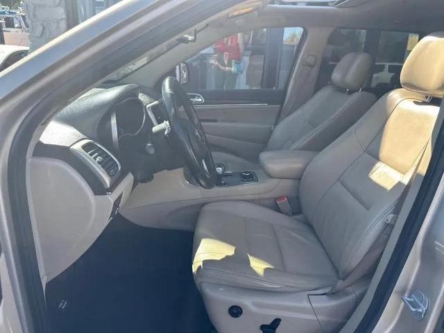 Photo of 2014 Beige Jeep Grand Cherokee