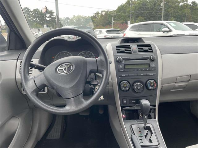 Photo of 2013 Tropical Sea Metallic Toyota Corolla