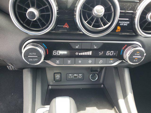 Photo of 2025 Aspen White Tricoat/Super Black Nissan Sentra