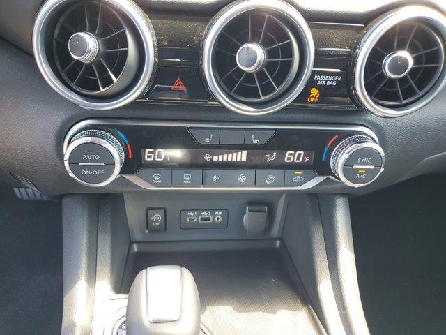 Photo of 2025 Aspen White Tricoat/Super Black Nissan Sentra
