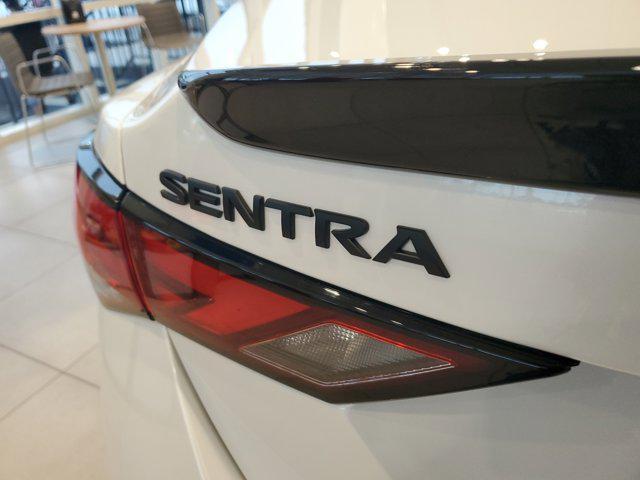 Photo of 2025 Aspen White Tricoat/Super Black Nissan Sentra
