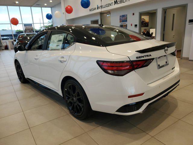 Photo of 2025 Aspen White Tricoat/Super Black Nissan Sentra