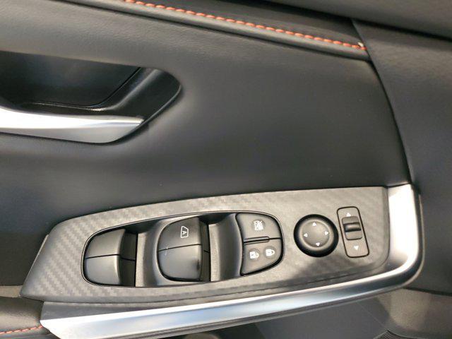 Photo of 2025 Aspen White Tricoat/Super Black Nissan Sentra