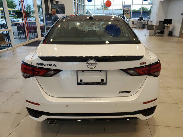 Photo of 2025 Aspen White Tricoat/Super Black Nissan Sentra