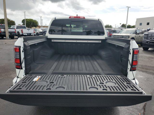 Photo of 2025 Glacier White Nissan Frontier