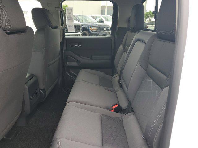Photo of 2025 Glacier White Nissan Frontier