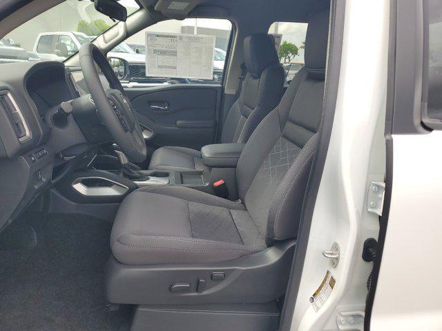 Photo of 2025 Glacier White Nissan Frontier