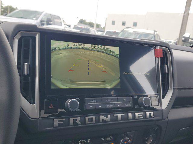 Photo of 2025 Glacier White Nissan Frontier