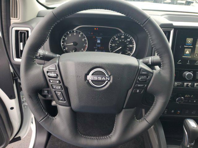 Photo of 2025 Glacier White Nissan Frontier