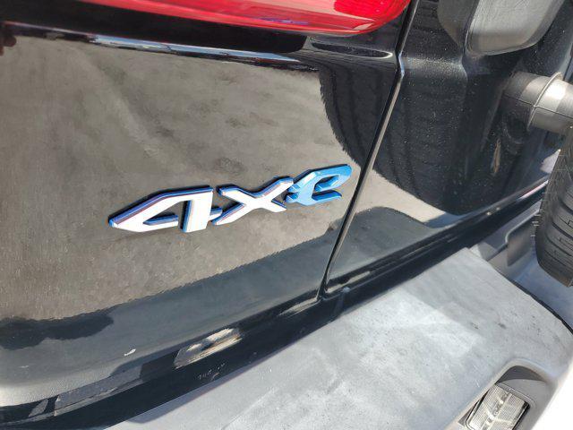Photo of 2021 Black Clearcoat Jeep Wrangler Unlimited 4xe
