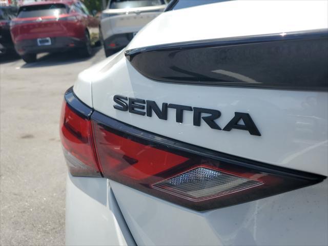 Photo of 2025 Aspen White Tricoat/Super Black Nissan Sentra