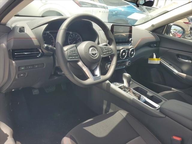 Photo of 2025 Aspen White Tricoat/Super Black Nissan Sentra