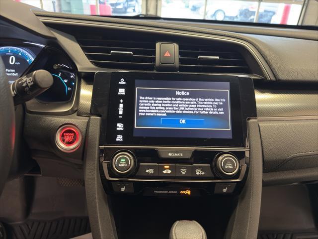 Photo of 2018 White Orchid Pearl Honda Civic