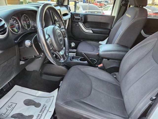 Photo of 2014 Bright White Clearcoat Jeep Wrangler Unlimited