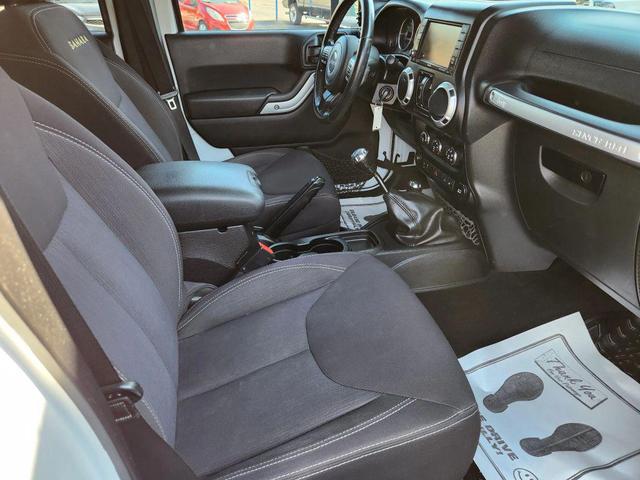 Photo of 2014 Bright White Clearcoat Jeep Wrangler Unlimited