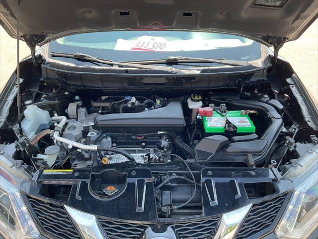 Photo of 2016 Midnight Jade Nissan Rogue
