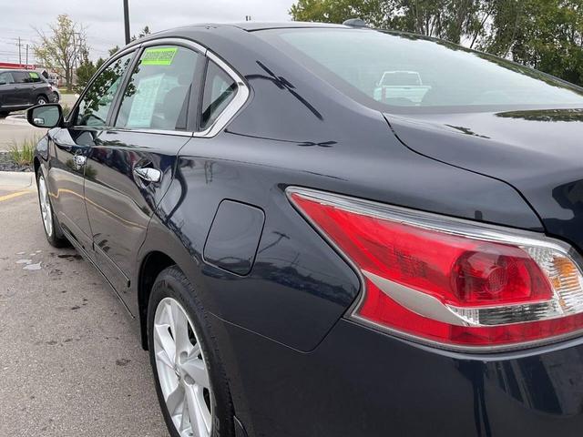 Photo of 2014 Storm Blue Metallic Nissan Altima