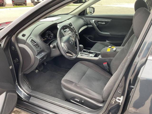 Photo of 2014 Storm Blue Metallic Nissan Altima