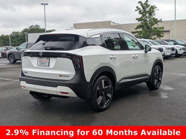 Photo of 2025 Aspen White Tricoat Nissan Kicks