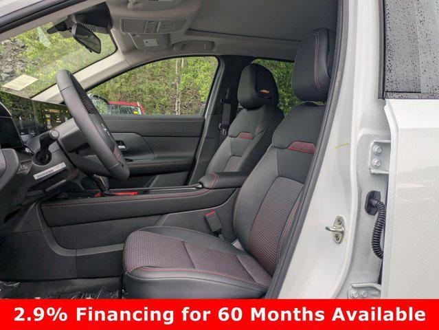 Photo of 2025 Aspen White Tricoat Nissan Kicks