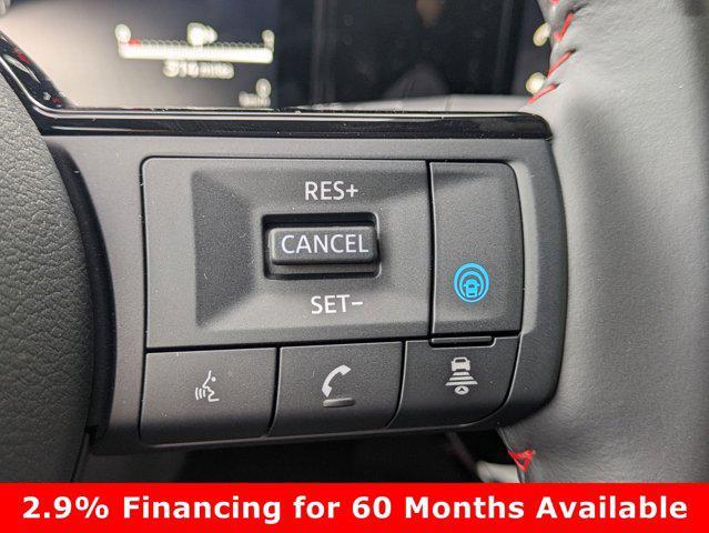 Photo of 2025 Aspen White Tricoat Nissan Kicks