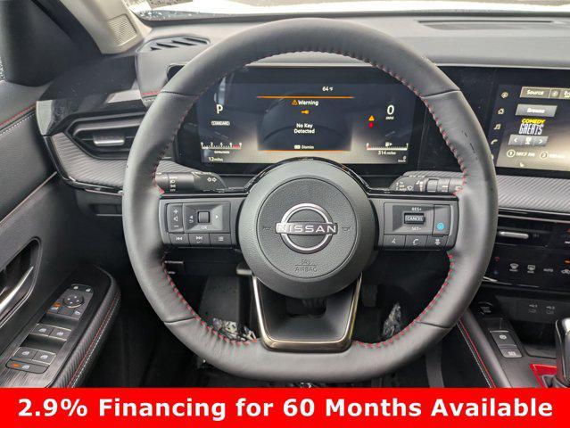 Photo of 2025 Aspen White Tricoat Nissan Kicks