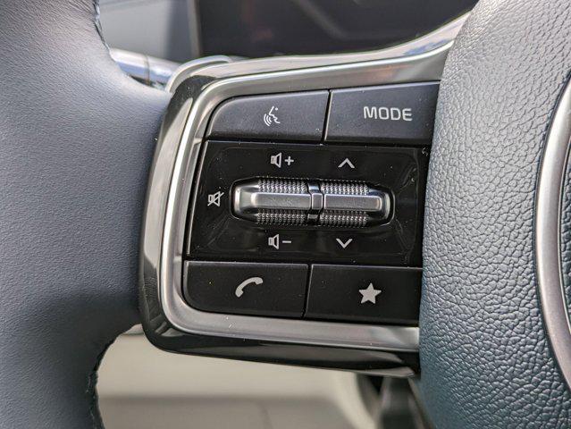 Photo of 2025 Ivory Silver Kia Carnival Hybrid
