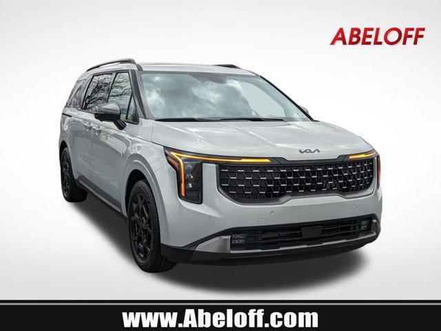 Photo of 2025 Ivory Silver Kia Carnival Hybrid
