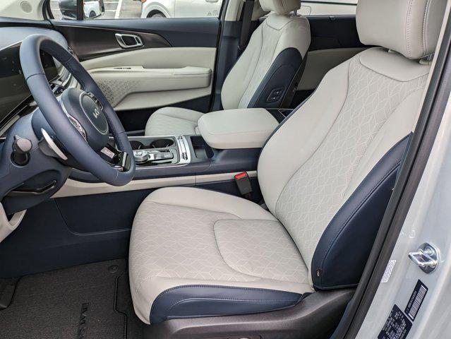 Photo of 2025 Ivory Silver Kia Carnival Hybrid